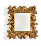 AN ITALIAN CARVED GILTWOOD WALL MIRROR, POSSIBLY FLORENTINE, 18TH CENTURY