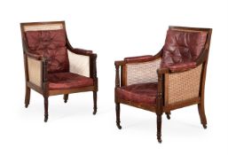 A PAIR OF MAHOGANY LIBRARY BERGERE ARMCHAIRS, IN REGENCY STYLE, EARLY 20TH CENTURY