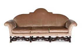 A PAIR OF LARGE WALNUT AND UPHOLSTERED SOFAS, IN WILLIAM & MARY STYLE, 20TH CENTURY