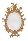A PAIR OF GEORGE III GILTWOOD OVAL MIRRORS, ATTRIBUTED TO WILLIAM & JOHN LINNELL