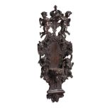 A CARVED OAK WALL MOUNT AND BRACKET, LATE 17TH/EARLY 18TH CENTURY