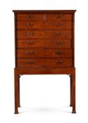 A PADOUK SECRETAIRE CABINET ON STAND, CIRCA 1800