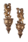 A PAIR OF GILTWOOD WALL MOUNTS IN THE FORM OF HERALDIC LIONS, 17TH CENTURY AND LATER