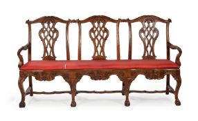 A CARVED WALNUT CHAIR-BACK SETTEE, PROBABLY PORTUGUESE, LATE 18TH CENTURY