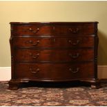 A GEORGE III MAHOGANY SERPENTINE COMMODE, IN THE MANNER OF THOMAS CHIPPENDALE, CIRCA 1770