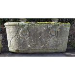 A WEATHERED STONE TROUGH IN THE FORM OF A ROMAN BATH POSSIBLY A 'GRAND TOUR' ACQUISITION
