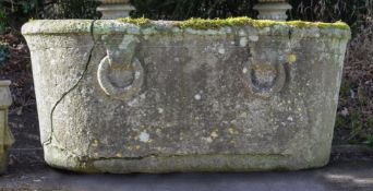 A WEATHERED STONE TROUGH IN THE FORM OF A ROMAN BATH POSSIBLY A 'GRAND TOUR' ACQUISITION