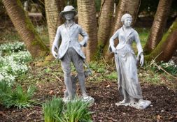 A PAIR OF LEAD GARDEN MODELS OF A PASTORAL COUPLE IN THE MANNER OF JOHN CHEERE, 20TH CENTURY
