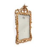 A GEORGE II CARVED GILTWOOD WALL MIRROR, MID-18TH CENTURY