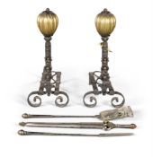 A LARGE PAIR OF WROUGHT IRON AND BRASS ANDIRONS, POSSIBLY DESIGNED BY J.H. POLLEN AND BY JOSHUA HART