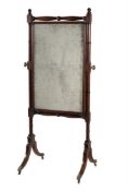 A GEORGE III MAHOGANY AND EBONISED CHEVAL MIRROR, IN THE MANNER OF GILLOWS, CIRCA 1815
