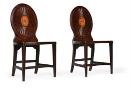 A PAIR OF GEORGE III MAHOGANY AND MARQUETRY HALL CHAIRS, IN THE MANNER OF MAYHEW & INCE