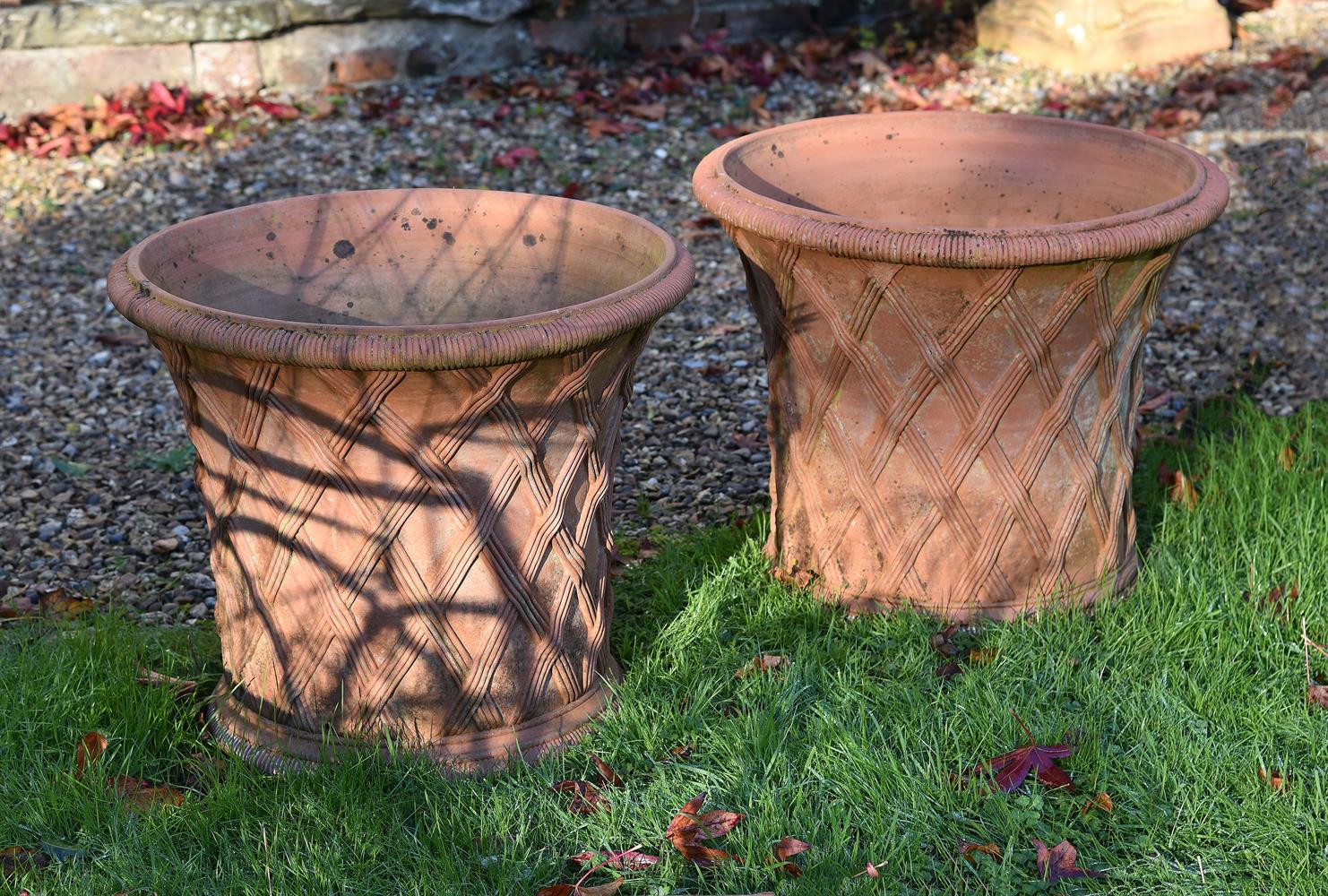 A PAIR OF TERRACOTTA 'BASKETWEAVE' POTS, IN THE MANNER OF DOULTON, 20TH CENTURY