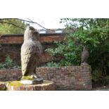 A PAIR OF COMPOSITION STONE OWL GATEPOST FINIALS, 20TH CENTURY