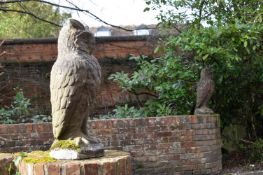 A PAIR OF COMPOSITION STONE OWL GATEPOST FINIALS, 20TH CENTURY