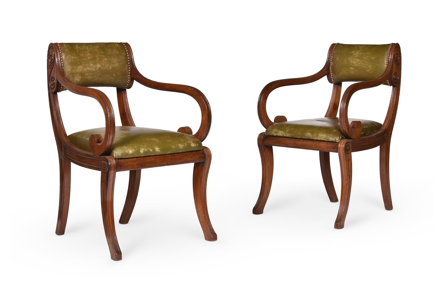A PAIR OR REGENCY MAHOGANY AND LEATHER UPHOLSTERED OPEN ARMCHAIRS, POSSIBLY SCOTTISH, CIRCA 1820