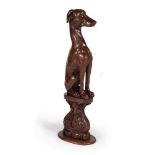 A REGENCY CARVED OAK MODEL OF A GREYHOUND, CIRCA 1820