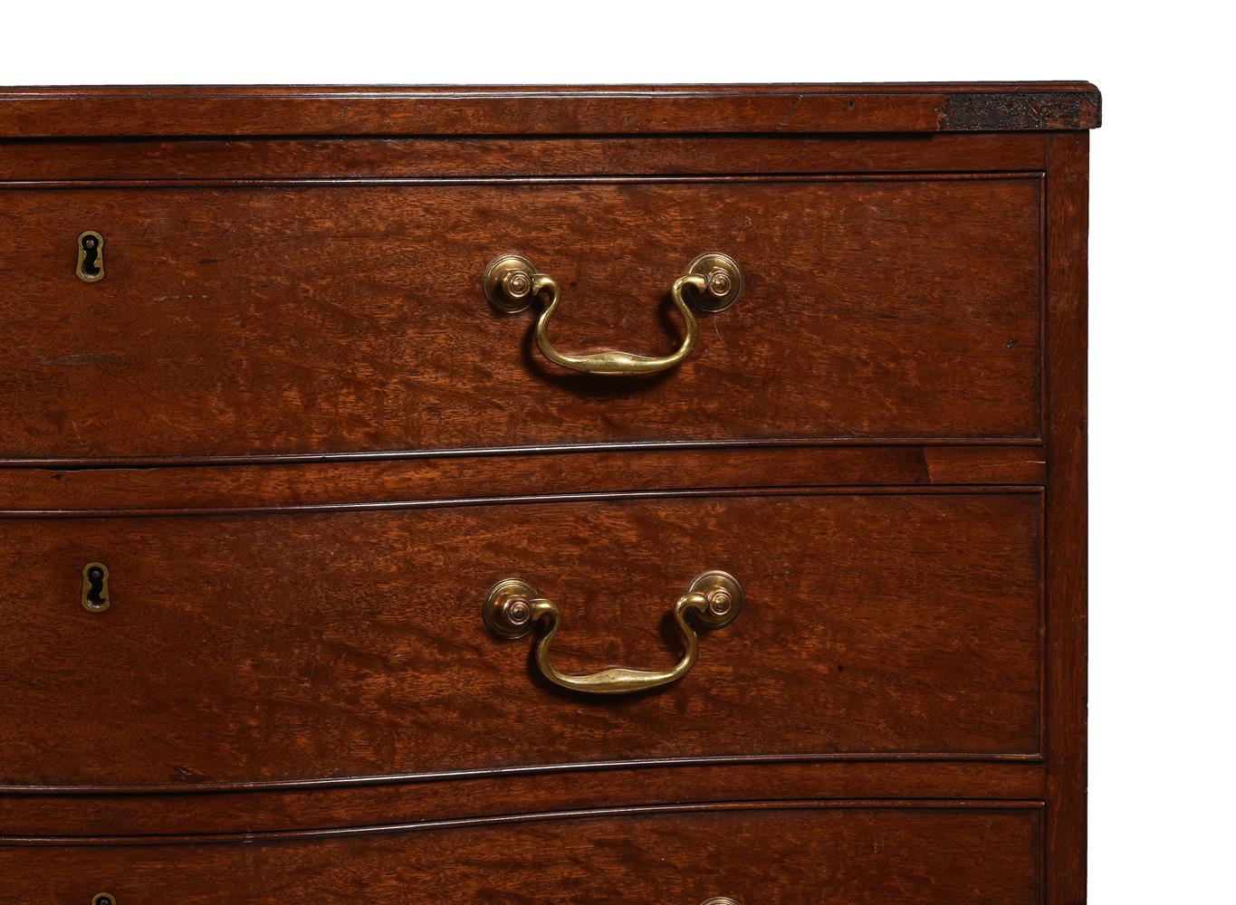 AN EARLY GEORGE III MAHOGANY SERPENTINE COMMODE, IN THE MANNER OF THOMAS CHIPPENDALE, CIRCA 1760 - Image 6 of 8