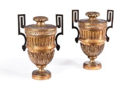 A PAIR OF ITALIAN SILVERED AND GILTWOOD ORNAMENTAL URNS, 18TH CENTURY