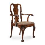 A GEORGE II WALNUT OPEN ARMCHAIR, IN THE MANNER OF GILES GRENDEY, CIRCA 1735