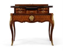 Y A KINGWOOD, ROSEWOOD, PARQUETRY AND ORMOLU MOUNTED WRITING TABLE, IN LOUIS XV STYLE