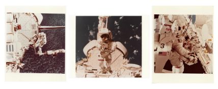 Three views of Bruce McCandless conducting an EVA, STS-41B, 3-11 Feb 1984