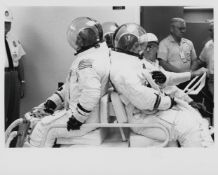 Unusual view of the Apollo 12 crew waiting to enter the altitude chamber, Apollo 12, 4 Jun 1969