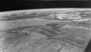 The first photograph of Earth taken with a handheld camera, Mercury-Atlas 6, 20 Feb 1962