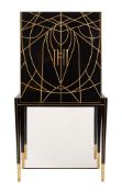 A BLACK AND GOLD COCKTAIL CABINET IN ART DECO STYLE