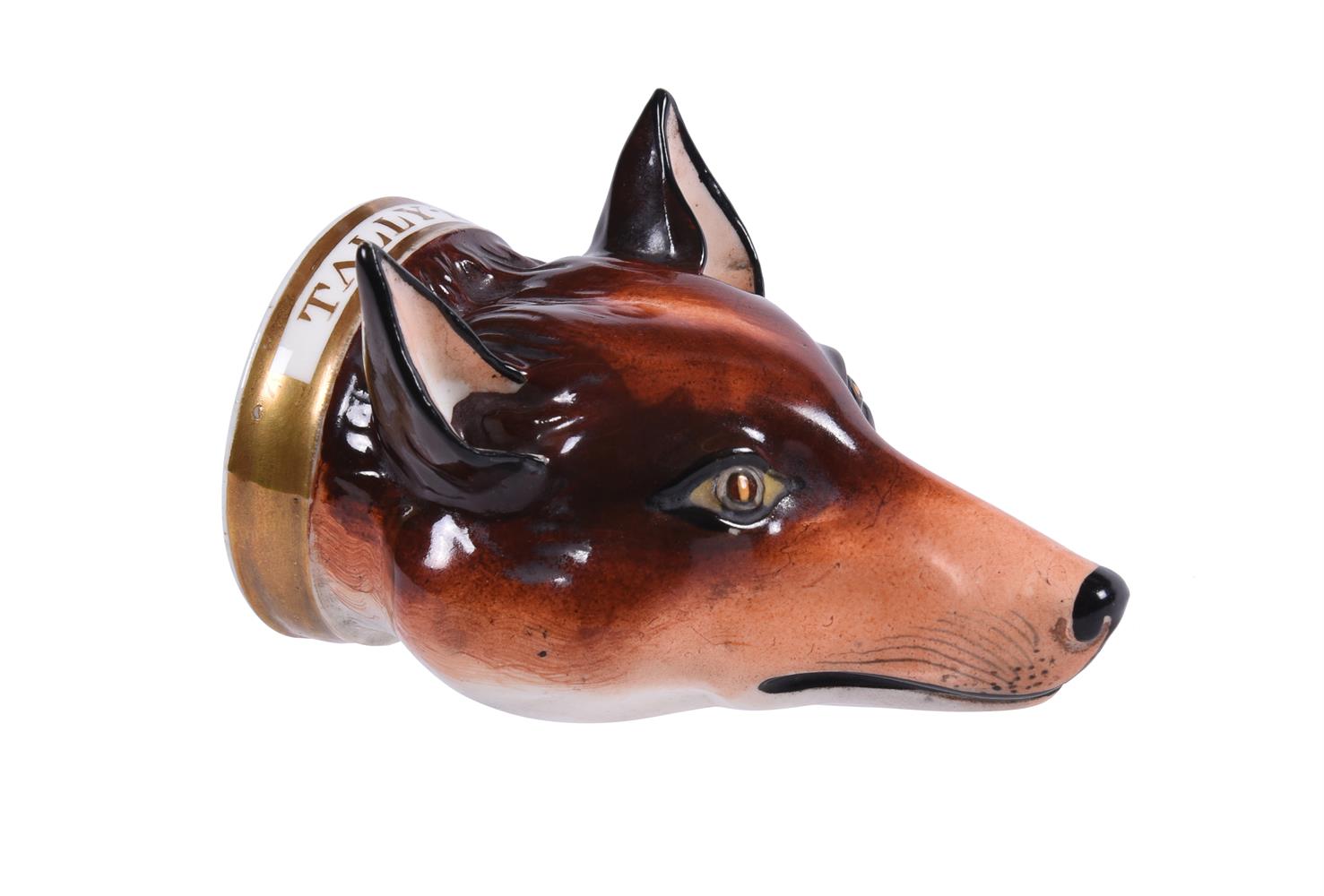 AN ENGLISH BONE CHINA PORCELAIN FOX MASK STIRRUP CUPCIRCA 1830Probably Staffordshire or Derby (Rob