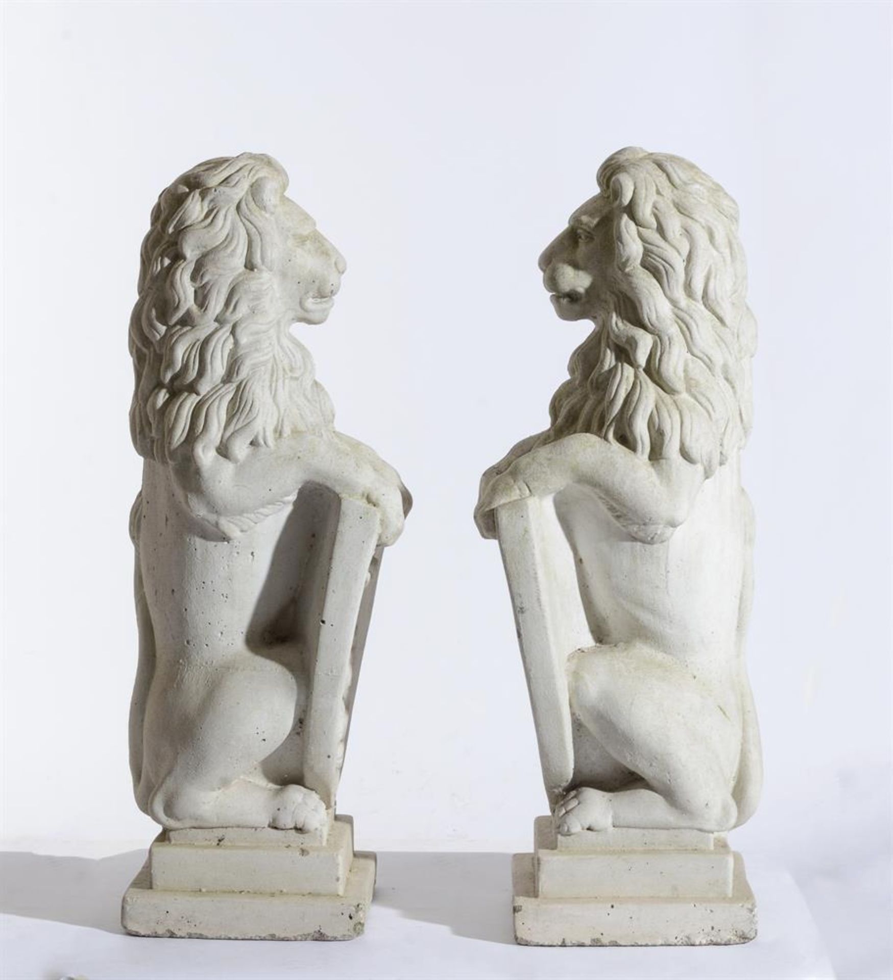 A PAIR OF WHITE PAINTED COMPOSITE STONE MODELS OF HERALDIC LIONS - Image 2 of 3