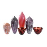 A GROUP OF SIX COLOURED AND CASED GLASS VASESIncluding four slender cased glass vases of tear-drop