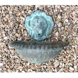 A VERDIGRIS PATINATED BRONZE LION MASK WALL FOUNT