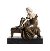 Y AN ART DECO BRONZE AND IVORY FIGURE OF A MAIDEN