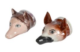 TWO ENGLISH PORCELAIN FOX MASK STIRRUP CUPS