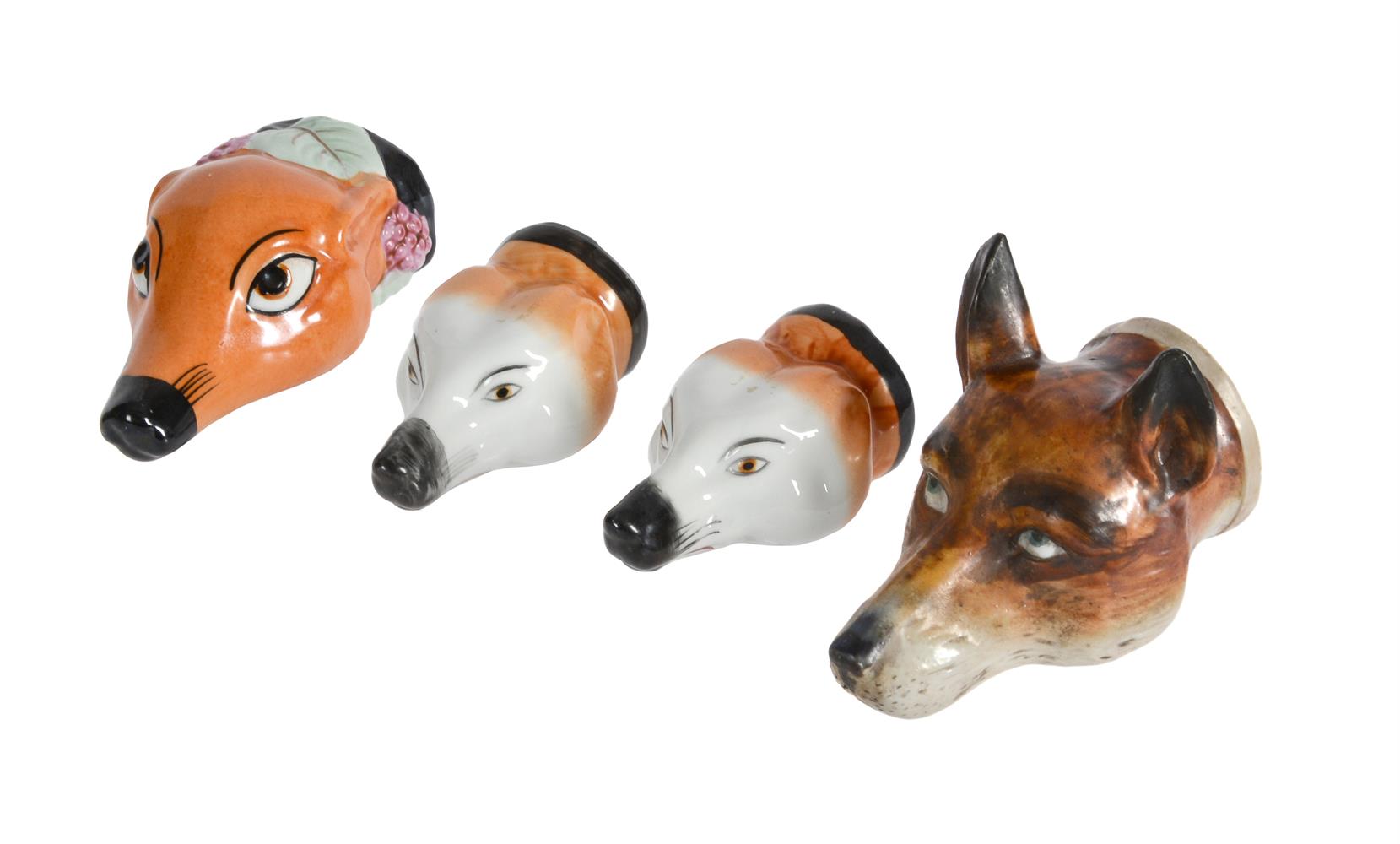 FOUR CONTINENTAL PORCELAIN FOX MASK STIRRUP CUPS