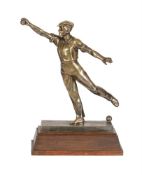 AN ART DECO SILVERED BRASS MODEL OF A BOULE OR PETANQUE PLAYER