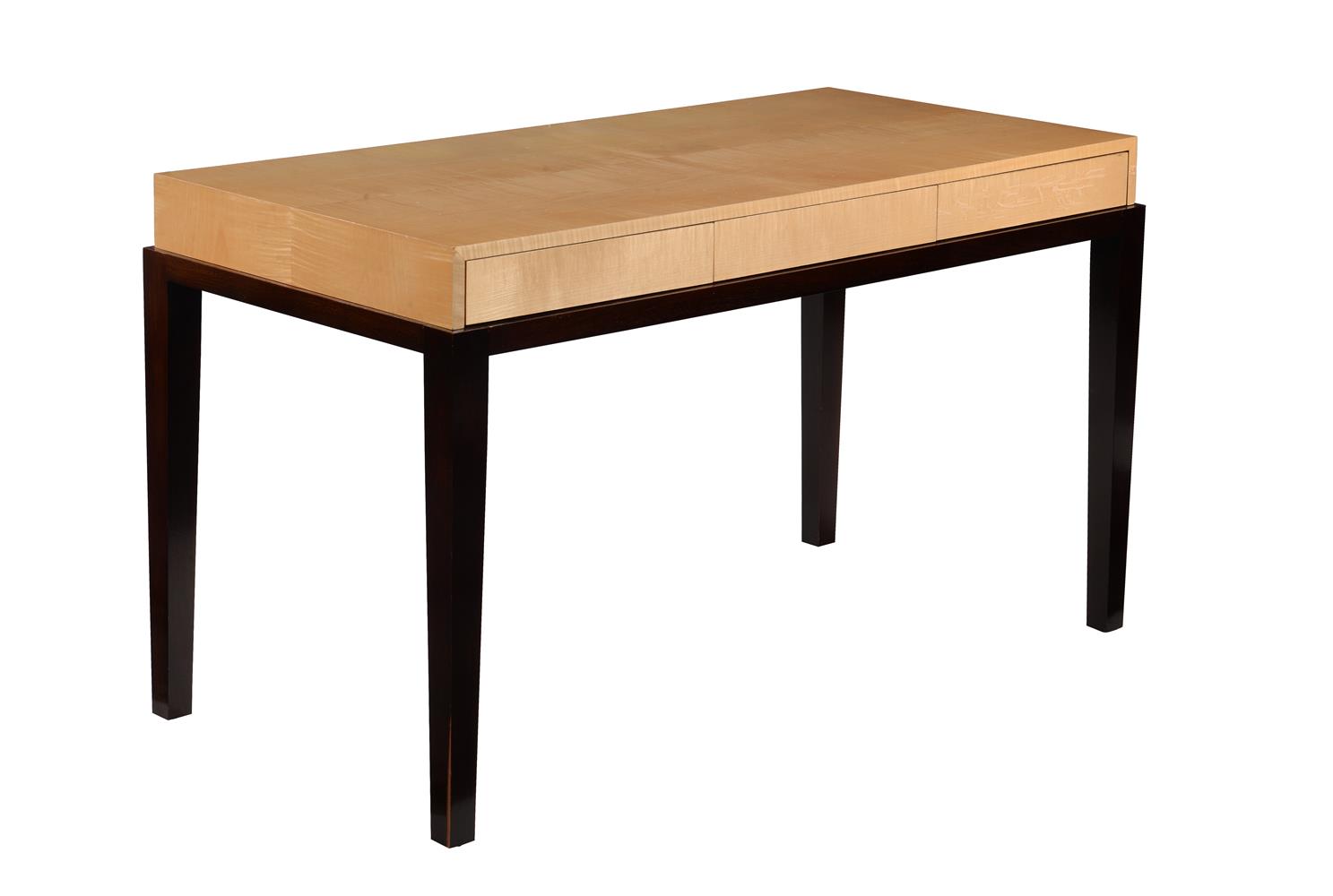 A MAPLE AND EBONISED WRITING TABLE