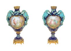 A PAIR OF FRENCH POTTERY SEVRES-STYLE GILT-METAL-MOUNTED TWO-HANDLED VASES