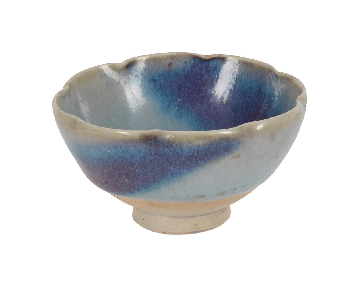 λ CHARLES VYSE (1882-1971); A SMALL FLORIFORM BOWL DECORATED WITH A CHUN BLUE GLAZE