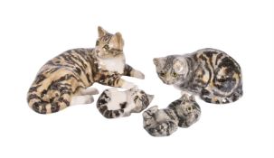 λ A GROUP OF FOUR ASSORTED WINSTANLEY MODELS OF TABBY CATS