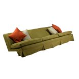 A LARGE GREEN UPHOLSTERED SOFA OR BANQUETTE