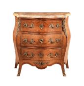 A FRENCH WALNUT AND GILT METAL MOUNTED COMMODE IN LOUIS XVI STYLE