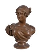 A PATINATED PLASTER BUST OF A LADY