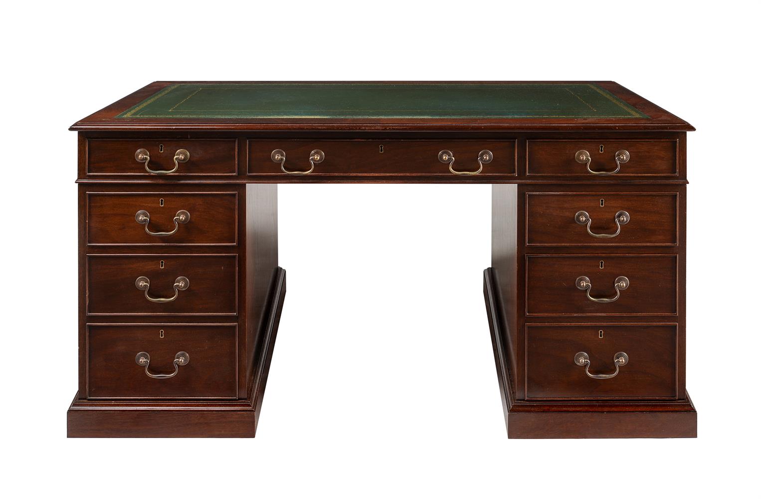 A MAHOGANY PEDESTAL DESK IN GEORGE III STYLE