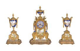 A FRENCH GILT SPELTER AND SEVRES STYLE PORCELAIN MANTEL CLOCK GARNITURE