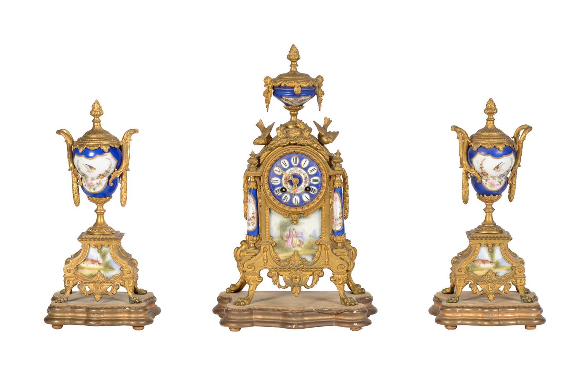 A FRENCH GILT SPELTER AND SEVRES STYLE PORCELAIN MANTEL CLOCK GARNITURE