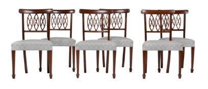 A SET OF EIGHT DINING CHAIRS IN GEORGE III STYLE