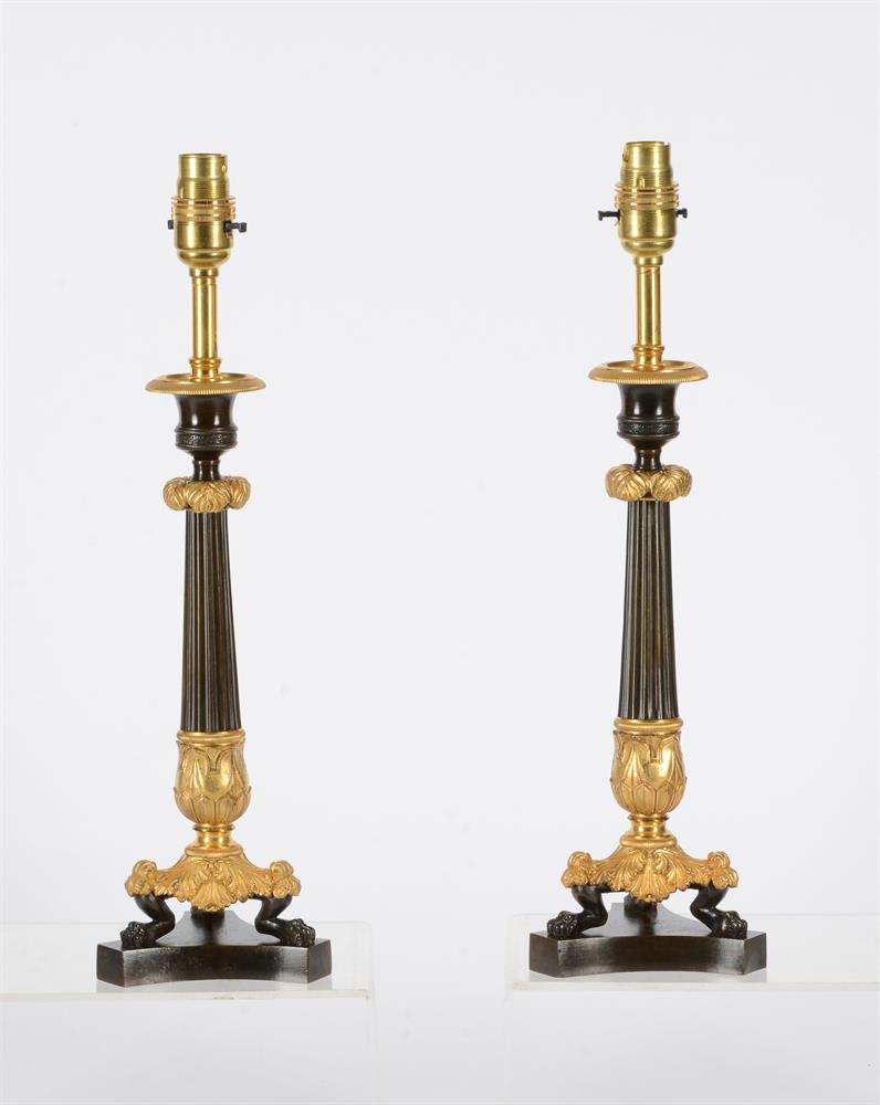 A PAIR OF PARCEL GILT AND PATINATED BRONZE CANDLESTICKS, IN LOUIS PHILIPPE STYLE - Image 2 of 2