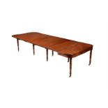 A GEORGE IV MAHOGANY D-END DINING TABLE